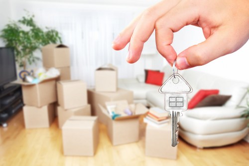 Household storage options for families in Harringay with boxed belongings and furniture