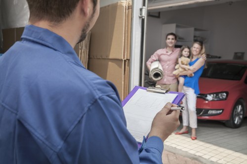 Staff reviewing ethical compliance documents in a storage business setting
