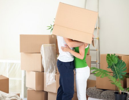 Packed boxes and furniture ready for storage in Harringay