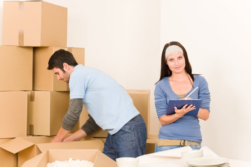 Local moving team handling furniture access in a North London property